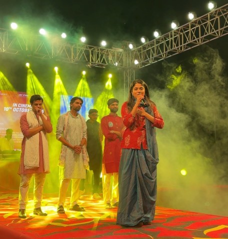 Reeva Rachh while anchoring an event