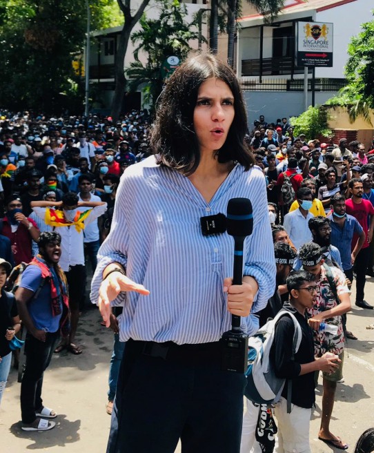 Runjhun Sharma while reporting a news report