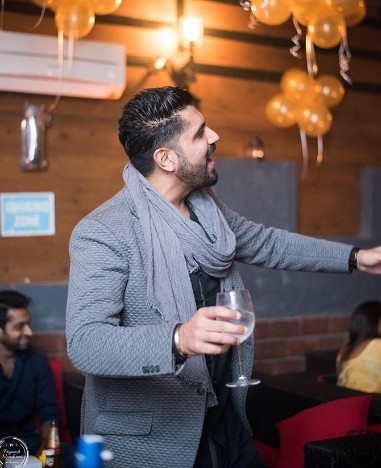 Saurabh Luthra while enjoying an alcoholic beverage
