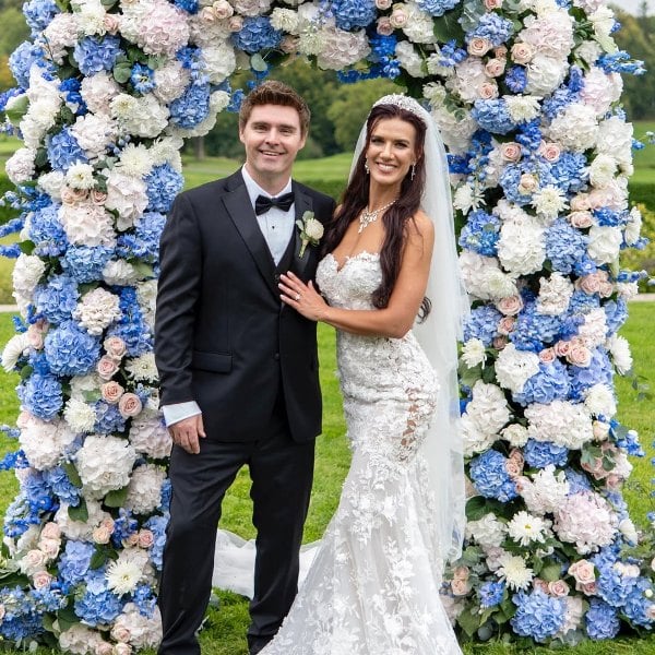 A picture of Natalie Burn and Timothy Woodward Jr from their wedding day