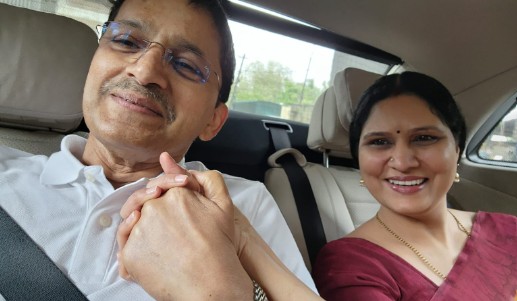 Asha Raghu with her husband
