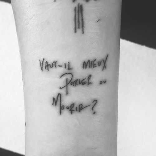 Bishop Briggs' French quote tattoo