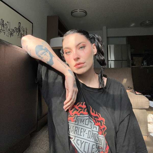 Bishop Briggs' tattoos on her side forearm