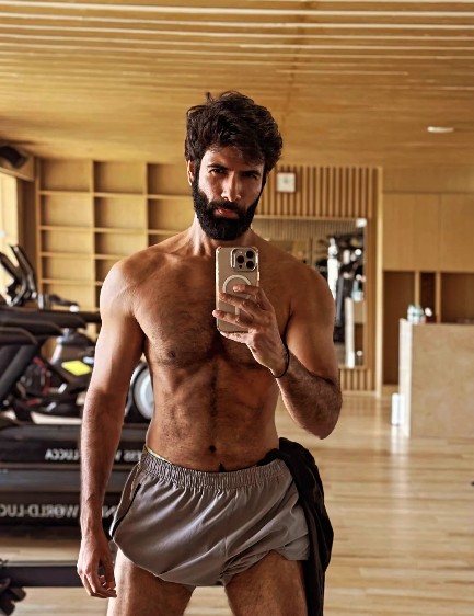 Danish Pandor posing at a gym