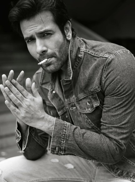 Danish Pandor while smoking a cigarette