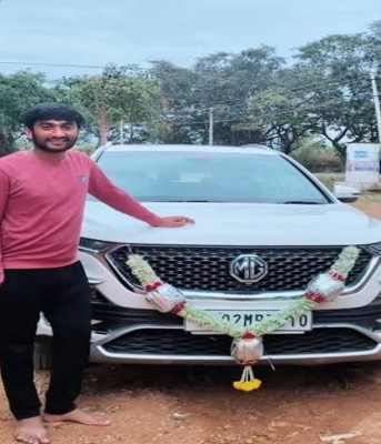 Gilli Nata with his MG