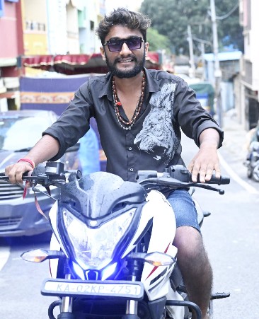 Gilli Nata with his Bajaj Pulsar