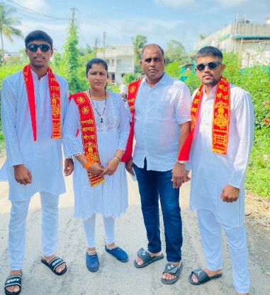 Henil Patel with his parents and brother