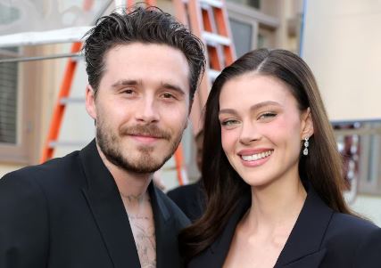 Nicola Peltz with her husband