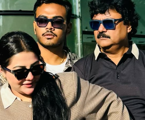 Pamela Goswami with her father and brother