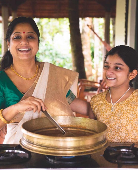 Ranjini Menon while cooking food at her Turmerica Plantation Homestay in Kerala, India