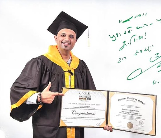 Bhagirath Bhatt posing with his honorary doctorate from Dunster Business School in Switzerland
