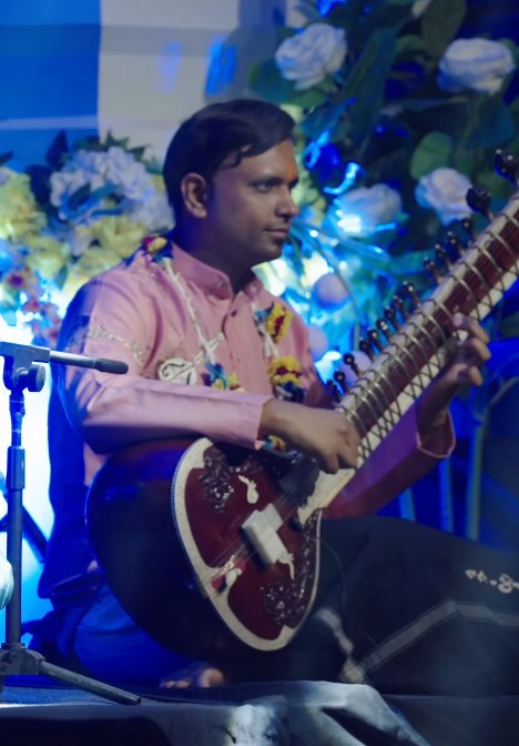Bhagirath Bhatt while playing sitar at an event