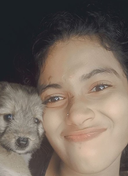 Chinnu Pappu with her pet dog
