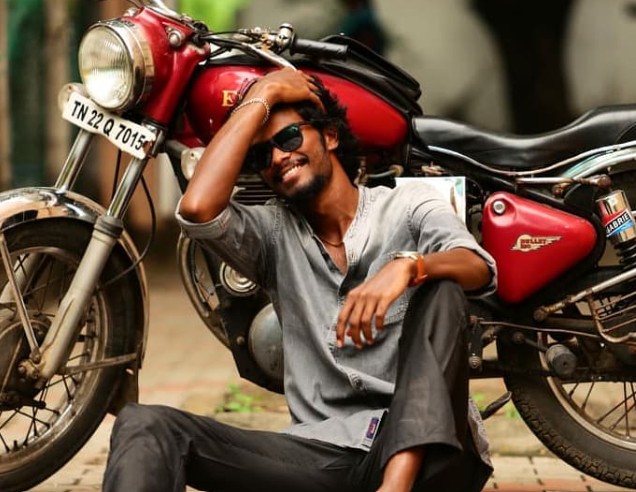 Dhakshineswar Suresh with his Royal Enfield
