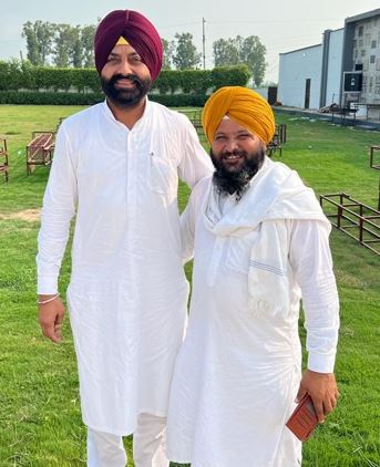 Harbrinder Singh (right) with Laljit Singh Bhullar