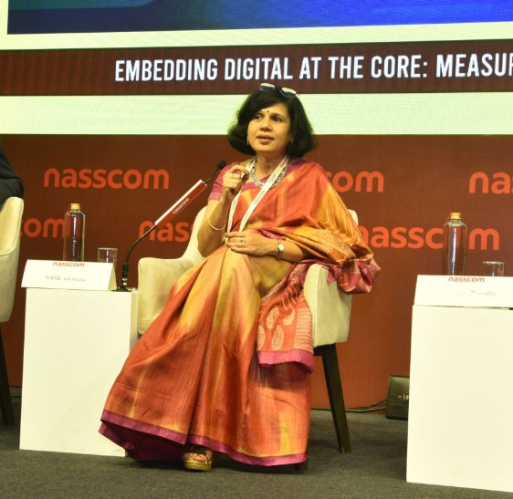 Irina Ghose speaking during a conference