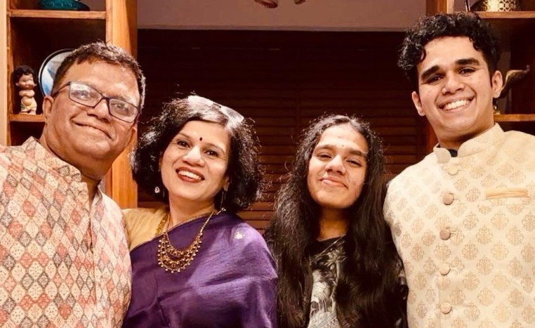 Irina Ghose with her husband and children