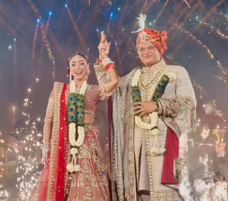 Kenisha Paliwal with her husband on their wedding day