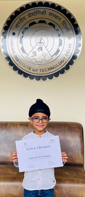 Ranvir Sachdeva, showing his certification of recognition by the Indian Institute of Technology Delhi (I-Hub Foundation for Cobotics) in New Delhi