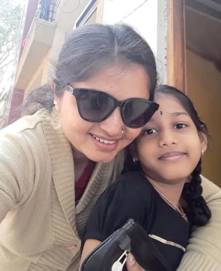 Rashmi Leela with her daughter