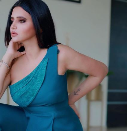 Redheemaa's tattoo on the left forearm