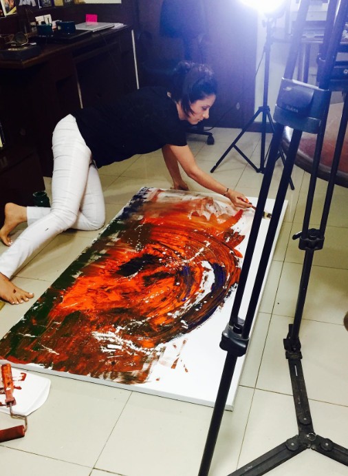 Rouble Nagi while painting