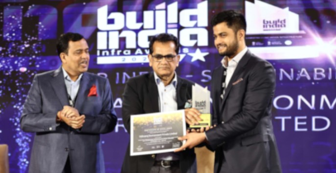 Sarang Lakhanee while receiving an award for his ideas on wastewater methane business