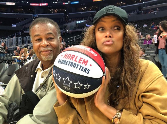 Tyra Banks with her father