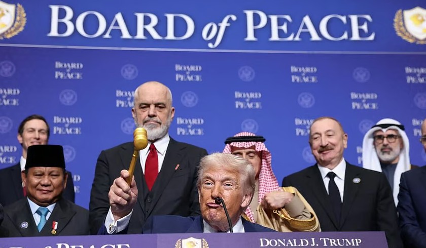 US President Donald Trump, while holding a gavel during the inaugural Board of Peace meeting