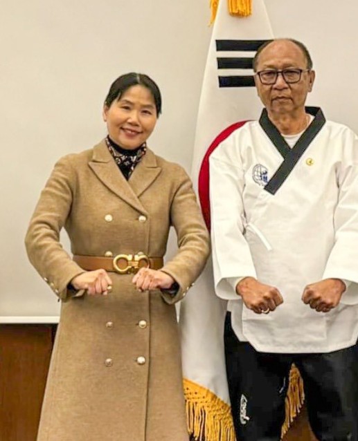 Yumnam Khemchand Singh posing in Taekwondo dress