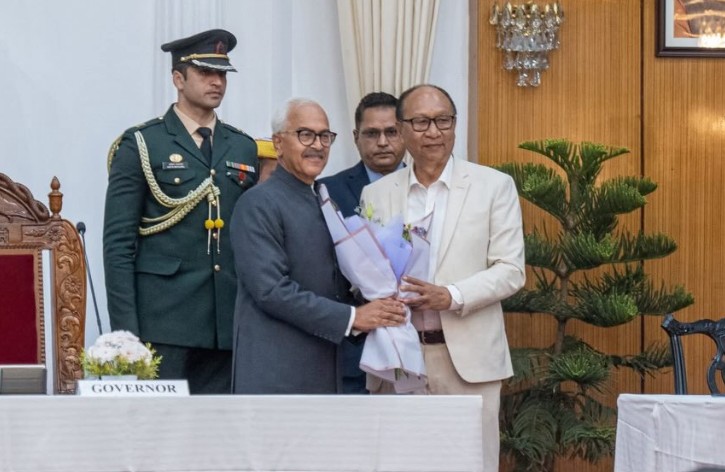 Yumnam Khemchand Singh while receiving flowers after being appointed as the Chief Minister of Manipur