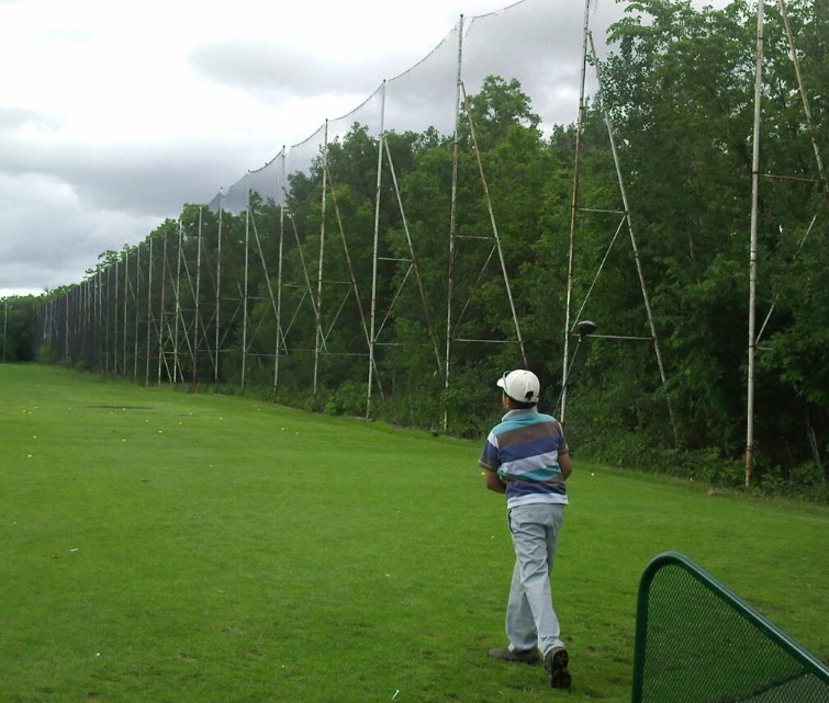 A childhood picture of Sudarshan while practising golf