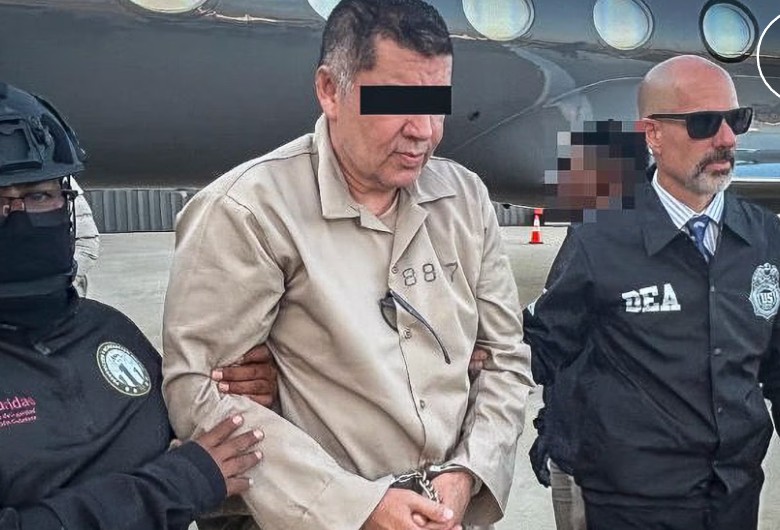 Abigael González Valencia, alias 'El Cuini', after being escorted by DEA agents