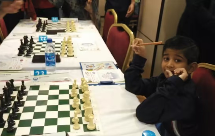 An old picture of Aarav Dengla during a chess competition