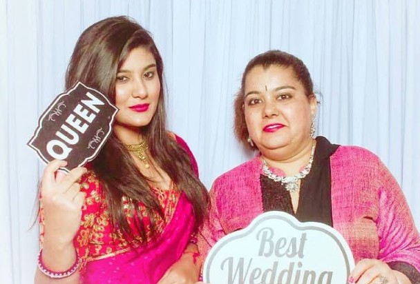 Harshil Kalia with her mother