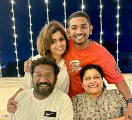 Karunas with his wife and children