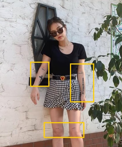 Maya Kibbel's tattoos on her both arms and legs