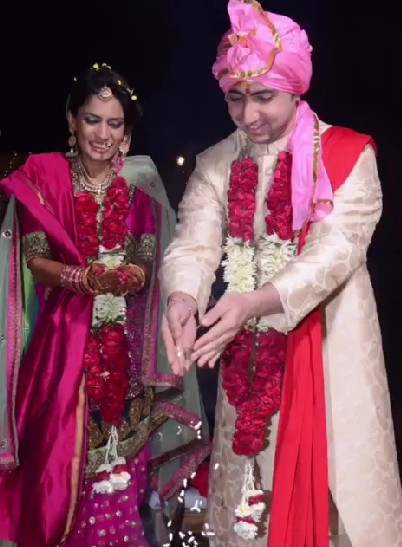 Mustafa Ahmed with his wife on their wedding day