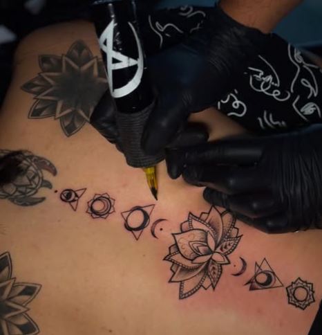 Tattoos on Aishwarya's back