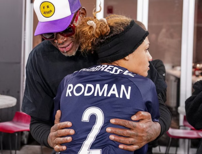 Trinity Rodman with her father