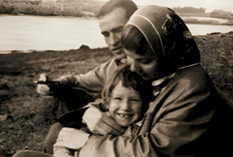 A childhood picture of Nathalie Baye with her parents