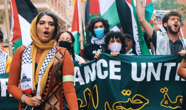 An old picture of Nerdeen Kiswani during a protest