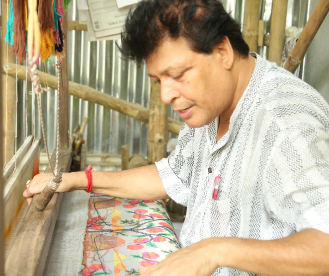 Biren Kumar Basak while weaving a sari