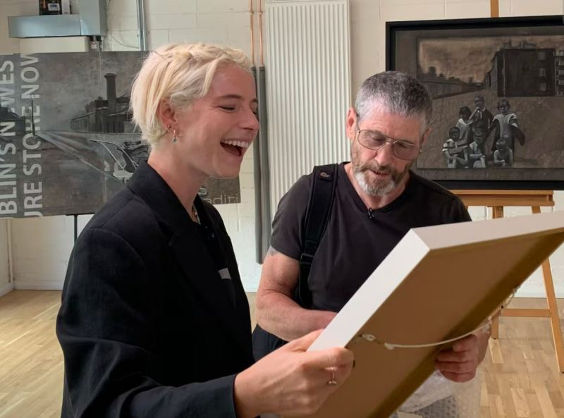 Jessie Buckley with artist Pat Curran at The Matt Talbot Community Trust