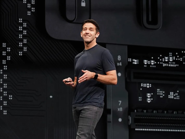 John Ternus while speaking at a workshop