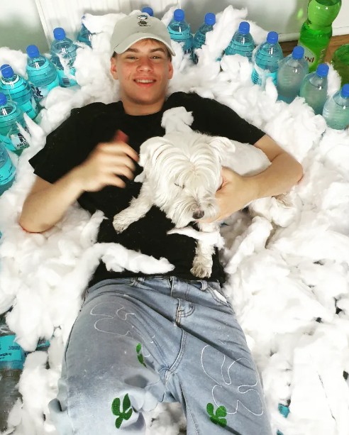 Łatwogang with his pet dog