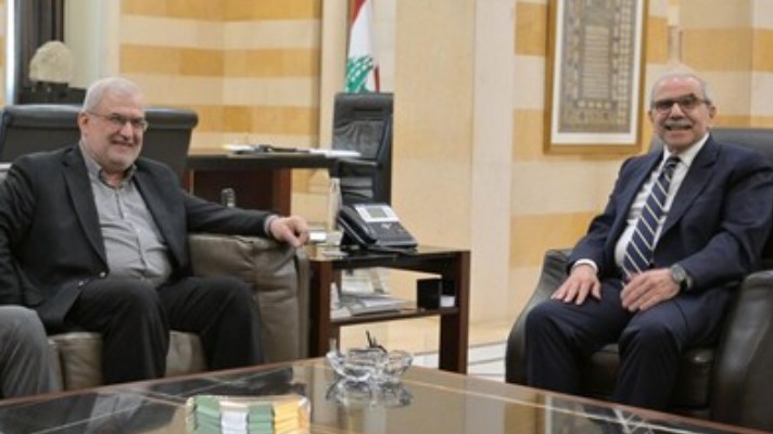 Nawaf Salam (right) in a meeting with Mohammad Raad, a Hezbollah leader, (left)