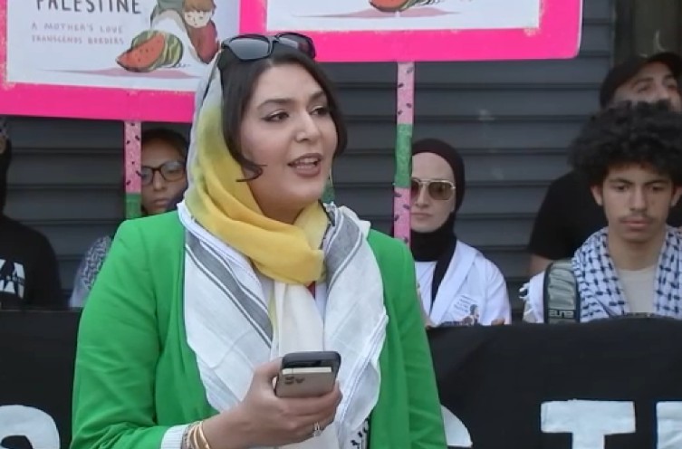 Nerdeen Kiswani speaking during a protest