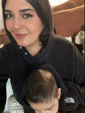 Nerdeen Kiswani with her child